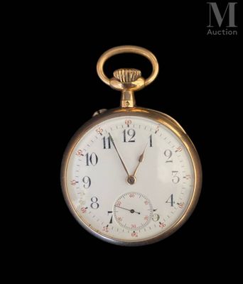 a close up of a pocket watch on a black background