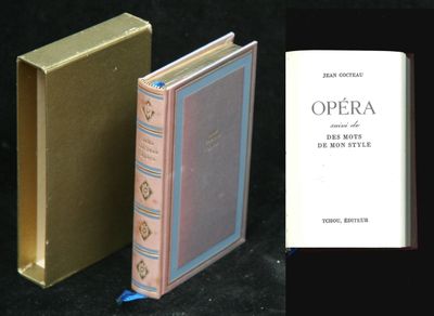 two open books sitting next to each other on a table