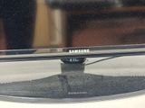 a picture of a samsung tv sitting on top of a table