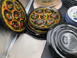 many plates and bowls that are on the table