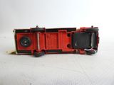 a toy train that is sitting on a white surface