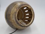 a small lamp that is sitting on a table