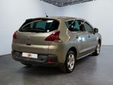 a silver car that is parked in a room