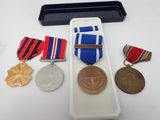 a small display case with medals and medals on it