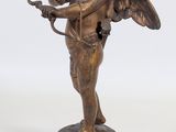 bronze statue of a cupid holding a bow and arrow