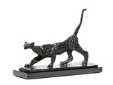 statue of a cat on a marble base on a white background