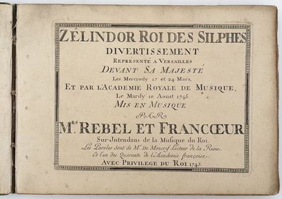 an old book with a black and white title on it