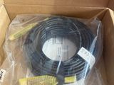 a box with a black hose inside of it