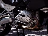 a motorcycle that is parked on the side of the road