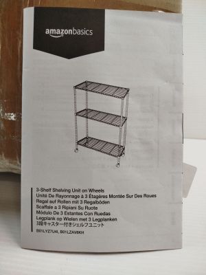 une image représentant une boîte sur laquelle figure l'illustration d'une étagère