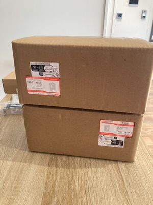 two boxes that are sitting on a table