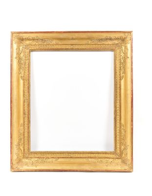 an old picture frame with a white background and a gold border