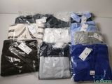 a lot of men ' s shirts that are wrapped in plastic