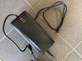 an overhead view of a power supply on a tiled floor