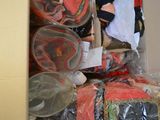 a box full of clothes and other items in the closet