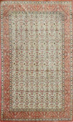 an antique persian rug with a red border and a white background