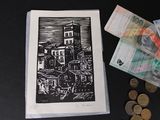a picture of a picture of a building and some money