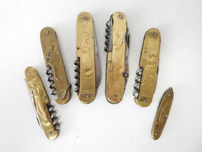 six different types of swiss army pocket knives on a white surface
