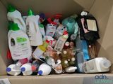a cardboard box full of cleaning products and cleaning products