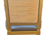 an image of a gold chair with blue upholstered cushion