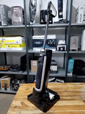 a vacuum that is sitting on a table in a room