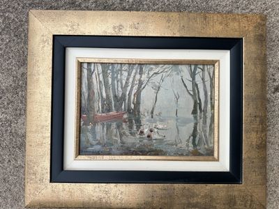 photo encadrée d'une peinture d'un bateau dans l'eau