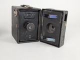 a small black safe box with a key in it