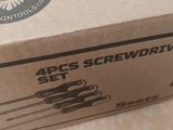 a box that has some tools in it on a table