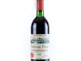 a bottle of wine that is sitting on a table