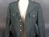 an image of a green military jacket on a mannequin