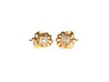 a pair of gold and diamond earrings