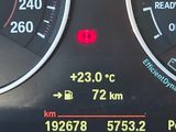 a close up of a speedometer on a car ' s dashboard