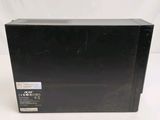 an image of a black microwave oven sitting on top of a white table