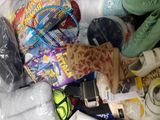 a pile of items in a plastic bag on the floor