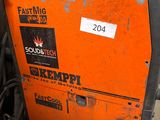 an orange machine with a sticker on the side of it