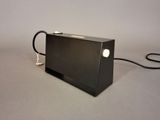 an image of a black electronic device on a table