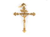 gold plated crucift with a crown on top of it