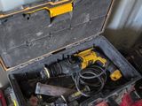 a tool box with tools in it sitting on the floor