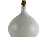 a white vase with a gold top on a white background