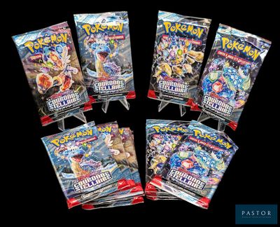 un lot de six paquets de cartes Pokémon empilés les uns sur les autres