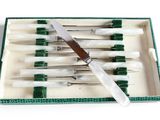 a box with a set of knives in it