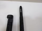 two microphones that are sitting on a table