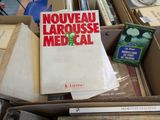 a box full of books that are sitting on a table