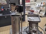 a machine that is sitting in the middle of a store