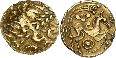 a gold coin with an image of a horse on it
