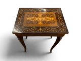 an image of a table with a design on the top of it
