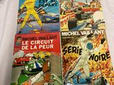 trois albums de la bande dessinée de course automobile de Michel Vaillant