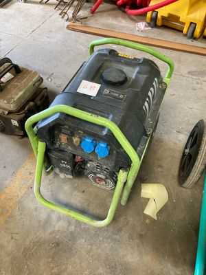 a generator that is sitting on the floor in the garage