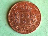 a close up of a coin with a crown on it