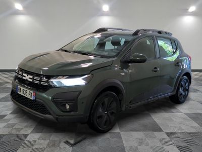 a grey suv parked in a room with a checkered floor